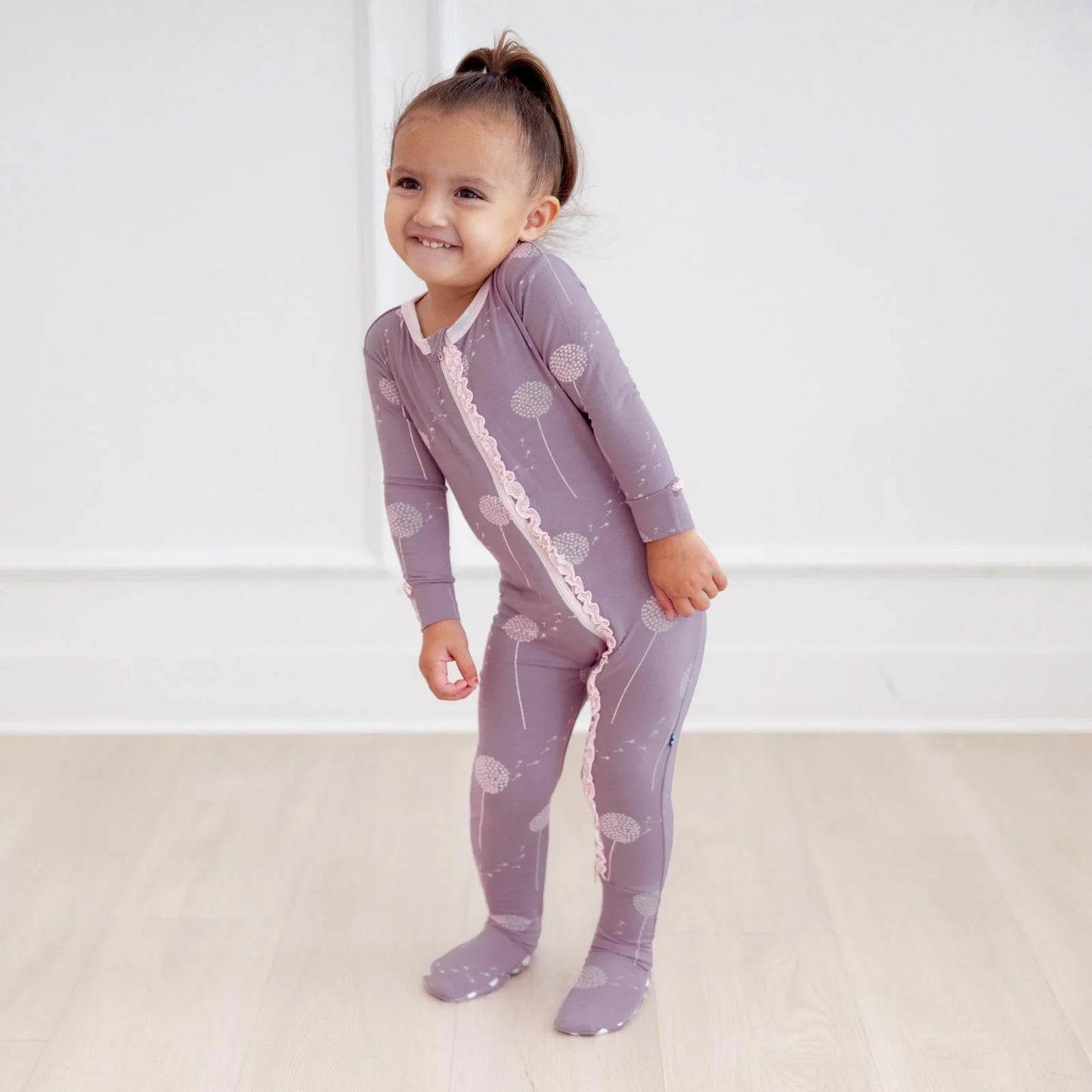 KicKee Lavender Dandelion Wish | Print Muffin Ruffle Footie With 2 Way Zipper