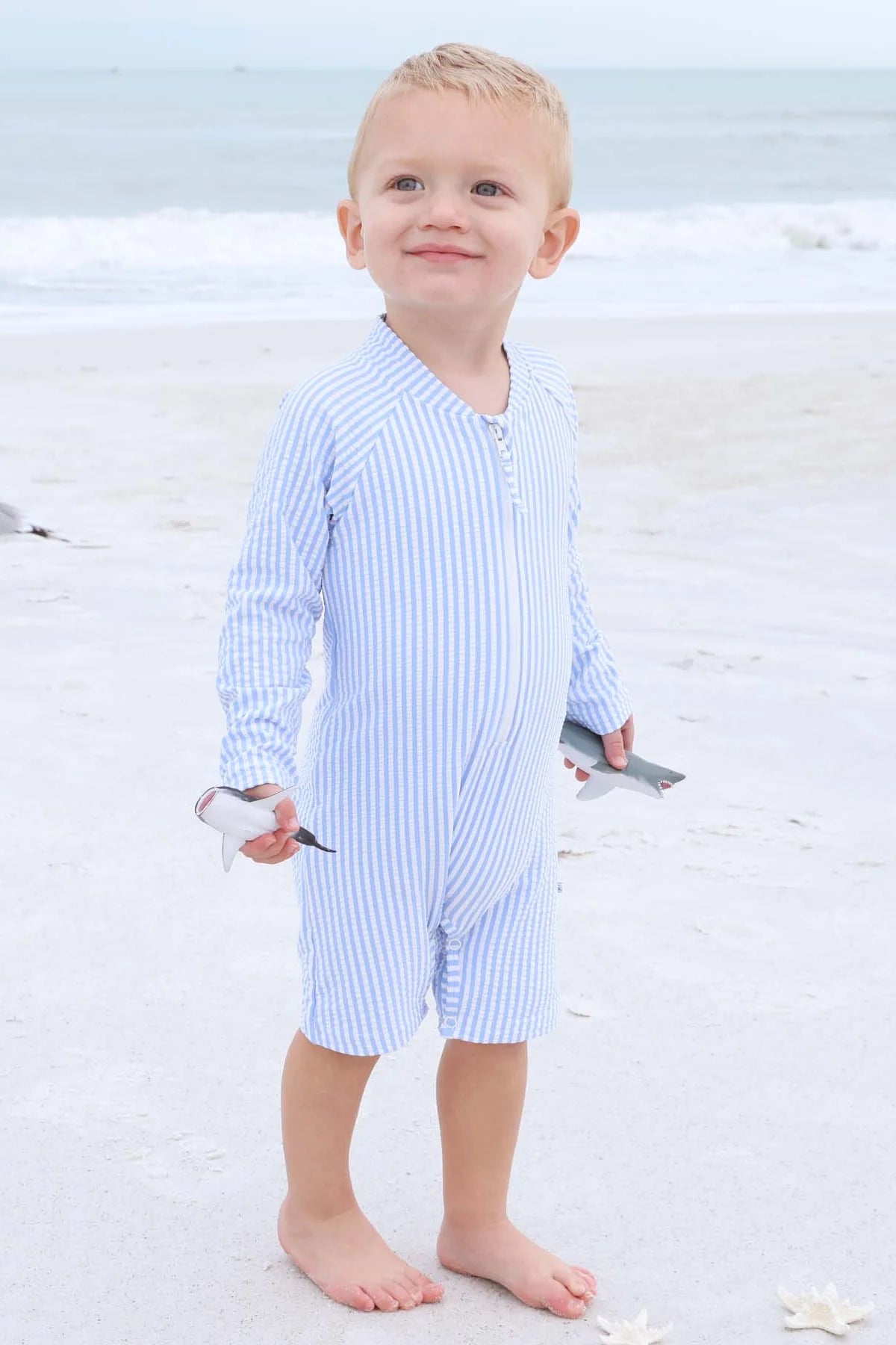 Caden Lane Blue | Seersucker Long Sleeve Rash Guard Swim Romper Shortie
